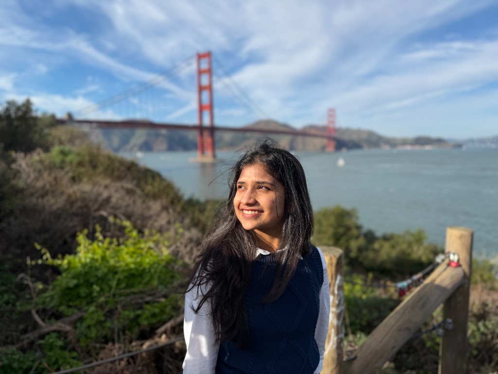 Portrait of Ananya Agarwal with the Golden Gate Bridge in the background